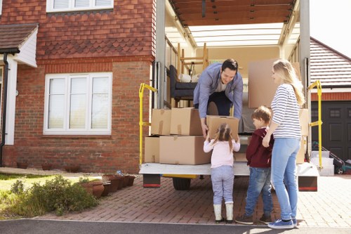 Loading business equipment for a commercial relocation in Enfield