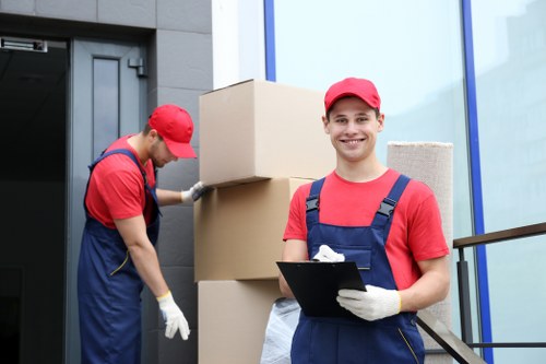 Transport van and moving boxes representing ethical removals operations