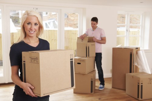 Careful handling of furniture during a house move in Enfield with tight access