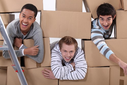 Organised workplace boxes and furniture prepared for a company move