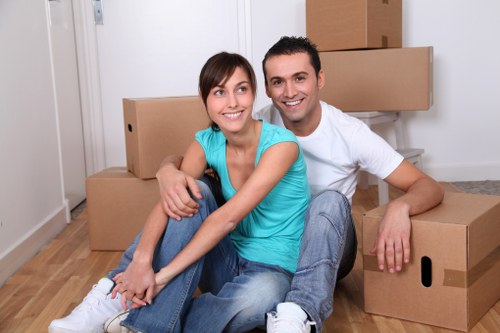 Packing and labelling office items before a move in Enfield
