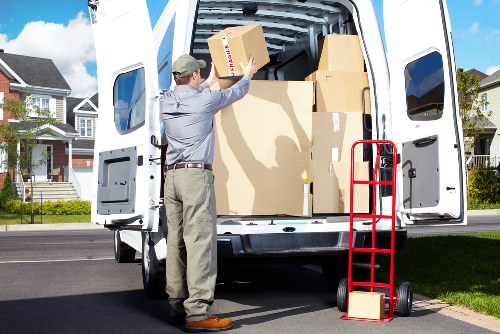 Packed boxes and furniture ready for house removals