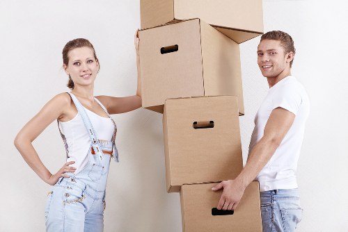 Professional piano removal team preparing an instrument for transport