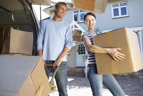 Professional movers handling access challenges for a flat move in Enfield